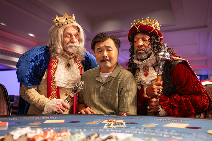 Person playing table games with two kings