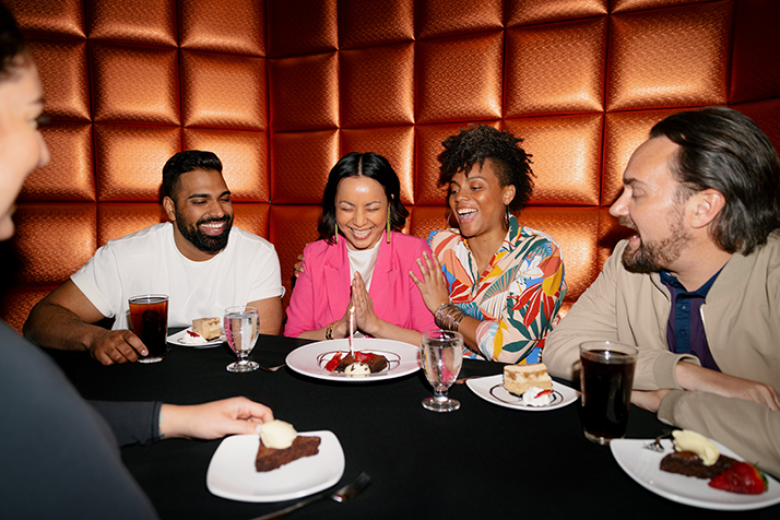 Group celebrating their beirthday as an Encore Rewards member